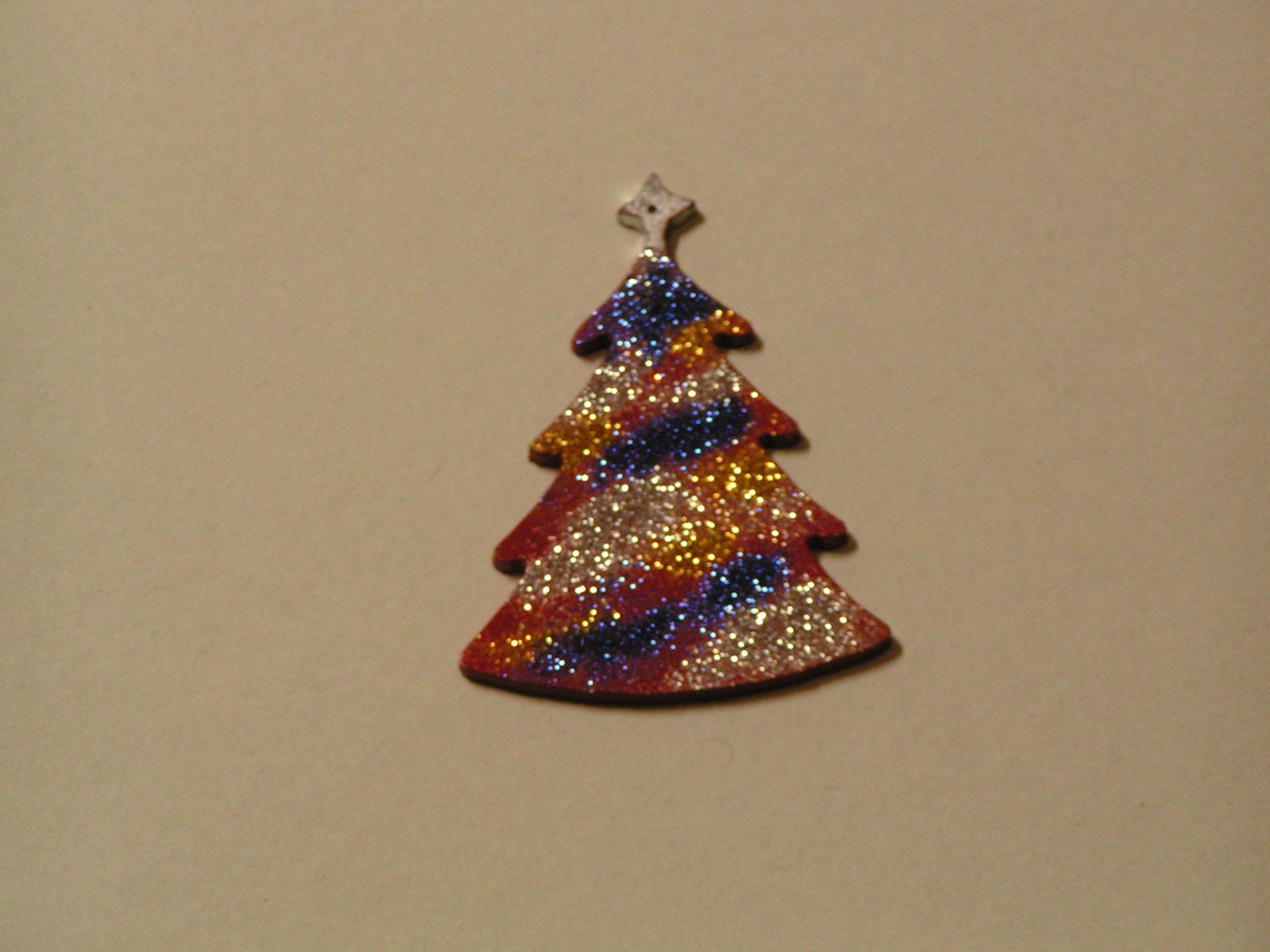 Christmas and holiday tree metal art ornament.